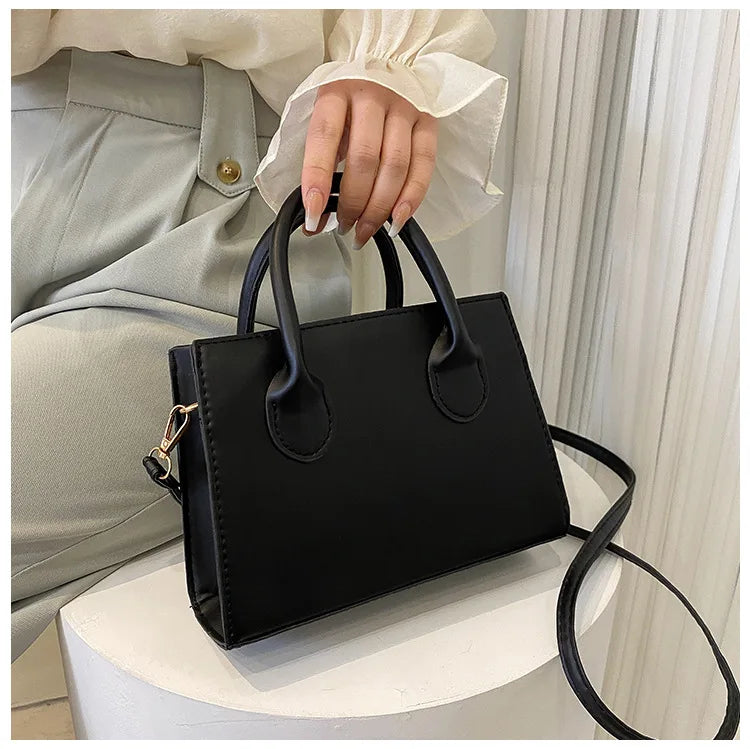 Bolso Negro Elegante — Doble Asa Bandolera Retro FuturaTrend