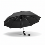 Parapluie pliant mini noir Falconetti ouvert sur fond blanc
