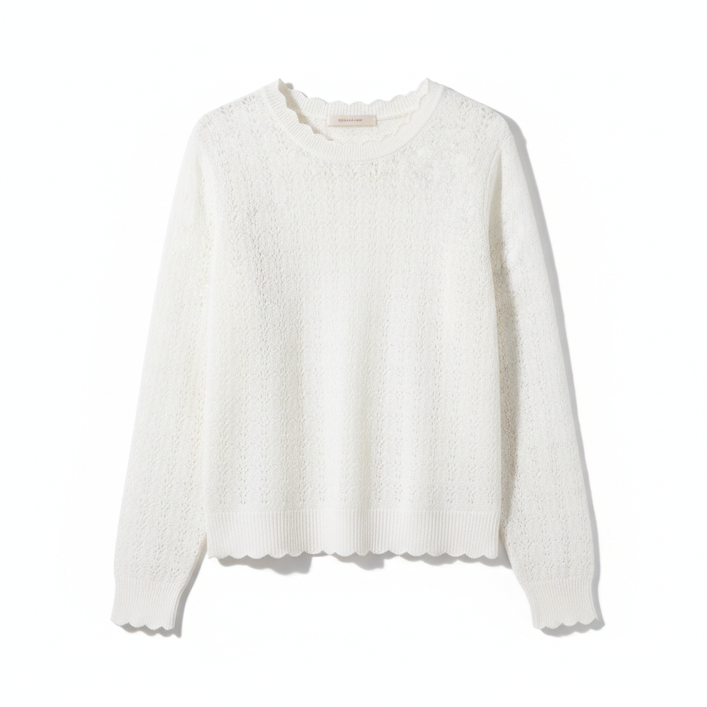 Pull blanc pointelle fond blanc